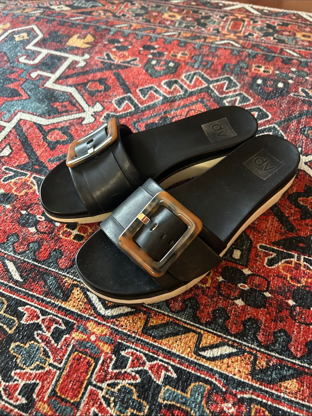 DV by Dolce Vita Black Slide Sandals with Tortoiseshell Buckle Detail
